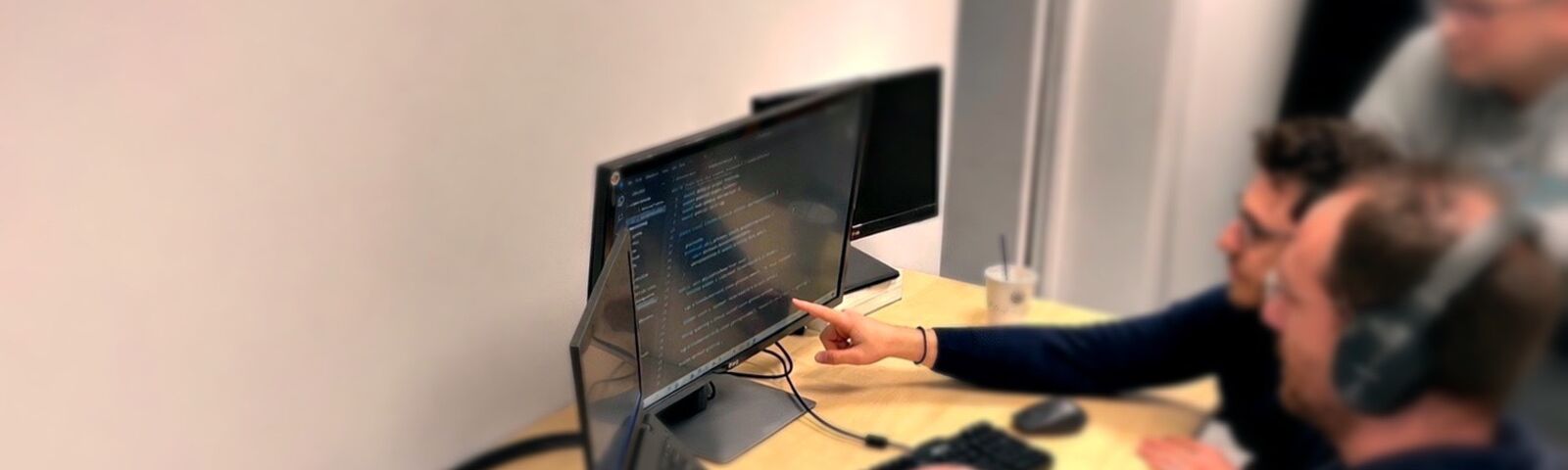 Engineers debugging code